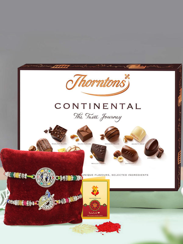 Gleaming Lord Ganesha & Peacock Rakhi With Thorntons Continental Dark Chocolate Gift