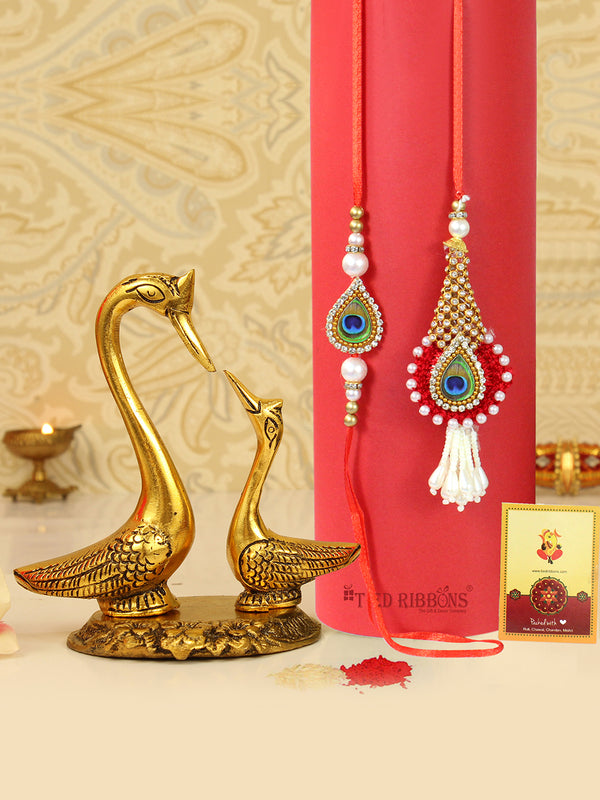 Rakhi for Brother and Bhabhi with Gift Set Swan Statue and Greeting Card